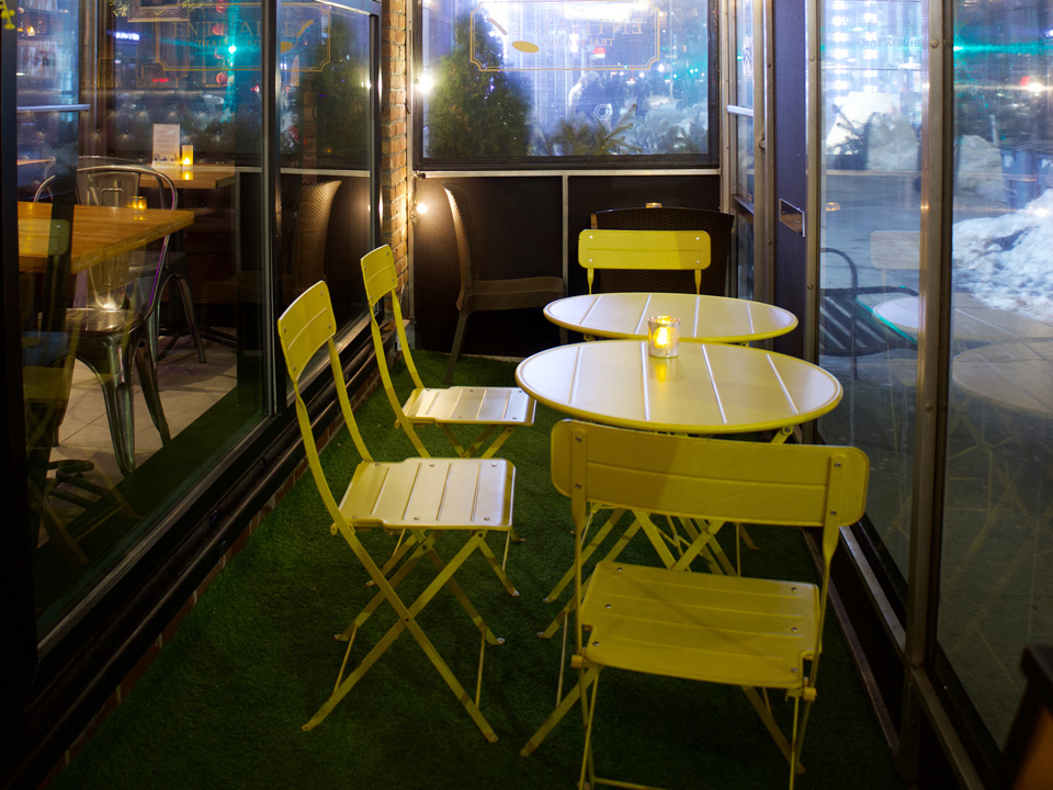 A diverse group of friends enjoying a meal together
